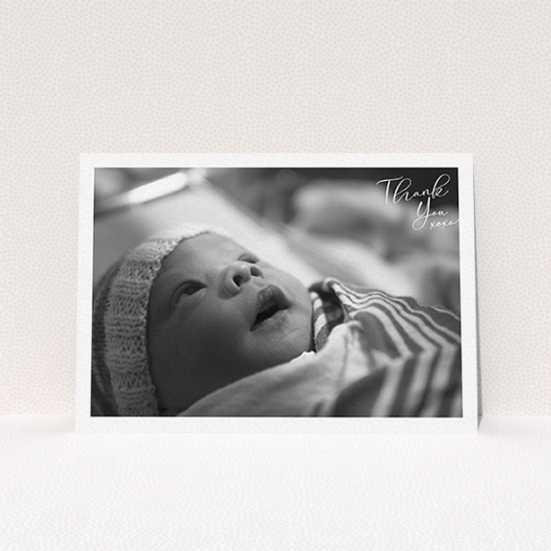 A baptism thank you card design titled "Simple Landscape Thanks". It is an A6 card in a landscape orientation. It is a photographic baptism thank you card with room for 1 photo. "Simple Landscape Thanks" is available as a flat card, with mainly white colouring.