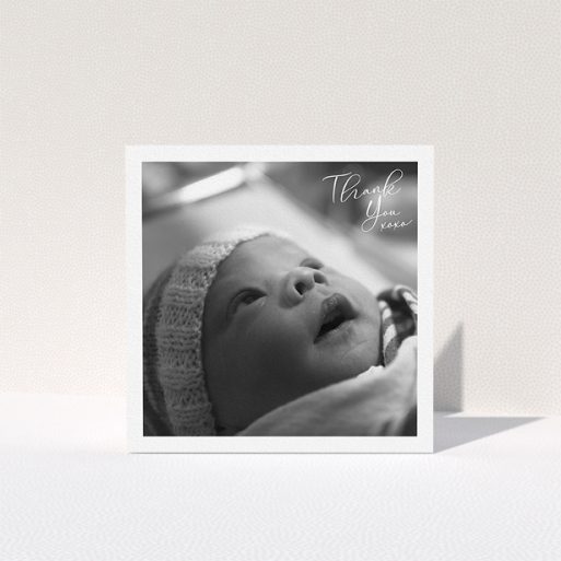 A baptism thank you card called "Simple Landscape Thanks". It is a square (148mm x 148mm) card in a square orientation. It is a photographic baptism thank you card with room for 1 photo. "Simple Landscape Thanks" is available as a folded card, with mainly white colouring.