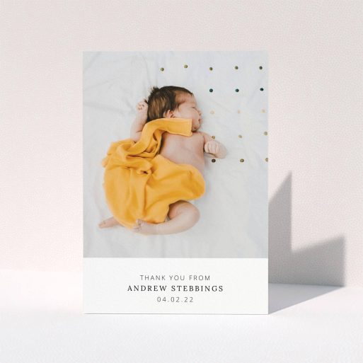 A baptism thank you card design titled "Simple, Portrait Thank You". It is an A5 card in a portrait orientation. It is a photographic baptism thank you card with room for 1 photo. "Simple, Portrait Thank You" is available as a folded card, with mainly white colouring.