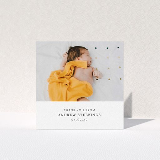 A baptism thank you card design named "Simple, Portrait Thank You". It is a square (148mm x 148mm) card in a square orientation. It is a photographic baptism thank you card with room for 1 photo. "Simple, Portrait Thank You" is available as a folded card, with mainly white colouring.
