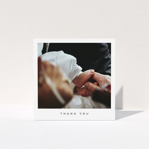 A baptism thank you card named "Simple Thanks". It is a square (148mm x 148mm) card in a square orientation. It is a photographic baptism thank you card with room for 1 photo. "Simple Thanks" is available as a folded card, with mainly white colouring.