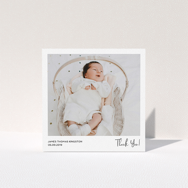 A baptism thank you card template titled "Simple Wedding Thank You". It is a square (148mm x 148mm) card in a square orientation. It is a photographic baptism thank you card with room for 1 photo. "Simple Wedding Thank You" is available as a folded card, with mainly white colouring.