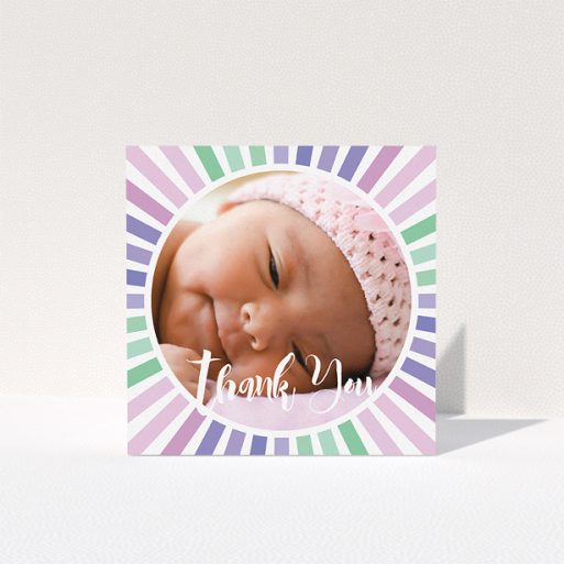 A baptism thank you card design named "Sun Centre". It is a square (148mm x 148mm) card in a square orientation. It is a photographic baptism thank you card with room for 1 photo. "Sun Centre" is available as a folded card, with mainly light pink colouring.