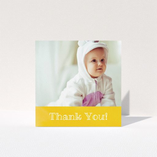 A baptism thank you card design called "Thanks In Yellow". It is a square (148mm x 148mm) card in a square orientation. It is a photographic baptism thank you card with room for 1 photo. "Thanks In Yellow" is available as a folded card, with tones of yellow and white.