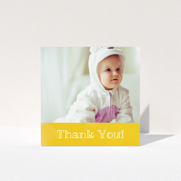 A baptism thank you card design called "Thanks In Yellow". It is a square (148mm x 148mm) card in a square orientation. It is a photographic baptism thank you card with room for 1 photo. "Thanks In Yellow" is available as a folded card, with tones of yellow and white.