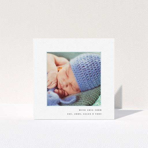 A baptism thank you card called "Thin Blue Frame". It is a square (148mm x 148mm) card in a square orientation. It is a photographic baptism thank you card with room for 1 photo. "Thin Blue Frame" is available as a folded card, with tones of white and blue.