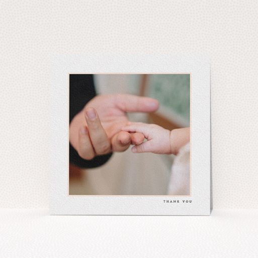 A baptism thank you card template titled "Thin Pink Frame". It is a square (148mm x 148mm) card in a square orientation. It is a photographic baptism thank you card with room for 1 photo. "Thin Pink Frame" is available as a flat card, with tones of white and pink.