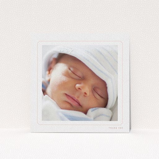 A baptism thank you card template titled "Thin Pink". It is a square (148mm x 148mm) card in a square orientation. It is a photographic baptism thank you card with room for 1 photo. "Thin Pink" is available as a flat card, with tones of white and pink.