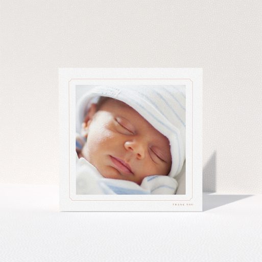 A baptism thank you card named "Thin Pink". It is a square (148mm x 148mm) card in a square orientation. It is a photographic baptism thank you card with room for 1 photo. "Thin Pink" is available as a folded card, with tones of white and pink.