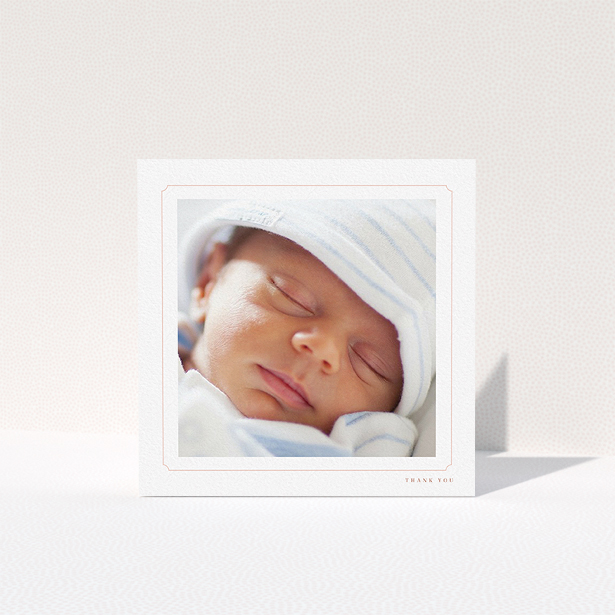 A baptism thank you card named "Thin Pink". It is a square (148mm x 148mm) card in a square orientation. It is a photographic baptism thank you card with room for 1 photo. "Thin Pink" is available as a folded card, with tones of white and pink.