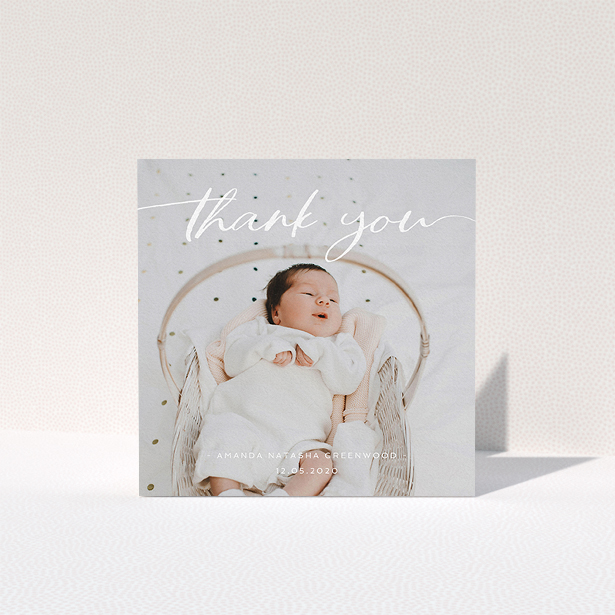 A baptism thank you card design named "Topped and Bottomed". It is a square (148mm x 148mm) card in a square orientation. It is a photographic baptism thank you card with room for 1 photo. "Topped and Bottomed" is available as a folded card, with mainly white colouring.