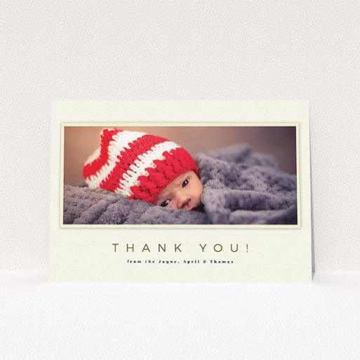 A baptism thank you card called "Torn Cream Frame". It is an A5 card in a landscape orientation. It is a photographic baptism thank you card with room for 1 photo. "Torn Cream Frame" is available as a flat card, with mainly cream colouring.