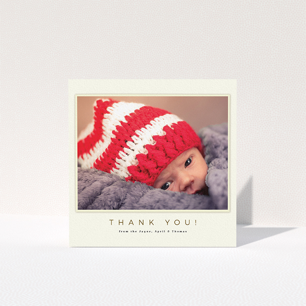 A baptism thank you card called "Torn Cream Frame". It is a square (148mm x 148mm) card in a square orientation. It is a photographic baptism thank you card with room for 1 photo. "Torn Cream Frame" is available as a folded card, with mainly cream colouring.