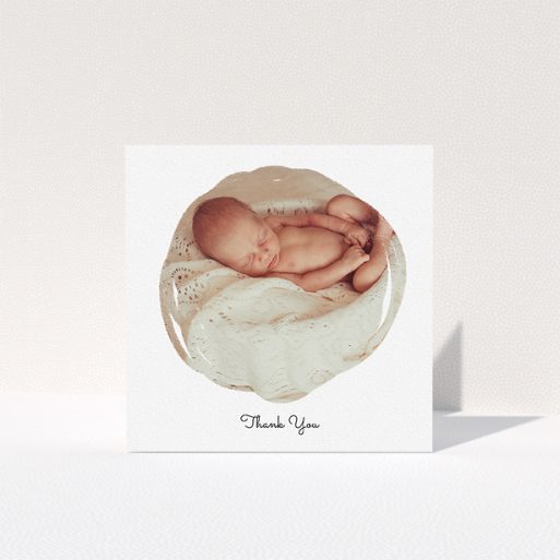 A baptism thank you card called "Wiped Banner". It is a square (148mm x 148mm) card in a square orientation. It is a photographic baptism thank you card with room for 1 photo. "Wiped Banner" is available as a folded card, with mainly white colouring.