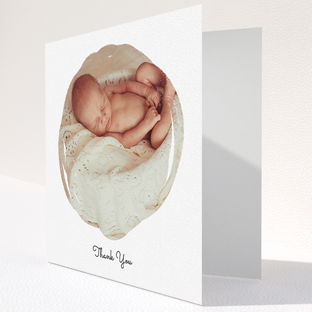 A baptism thank you card called "Wiped Banner". It is a square (148mm x 148mm) card in a square orientation. It is a photographic baptism thank you card with room for 1 photo. "Wiped Banner" is available as a folded card, with mainly white colouring.