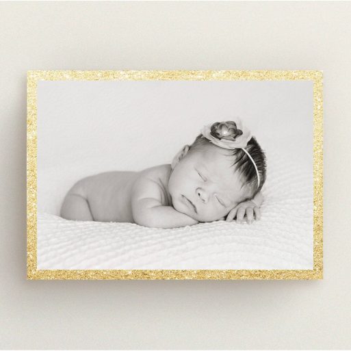 A birth announcement card called "All that Glitters". It is an A5 card in a landscape orientation. It is a photographic birth announcement card with room for 1 photo. "All that Glitters" is available as a flat card, with tones of gold and white.