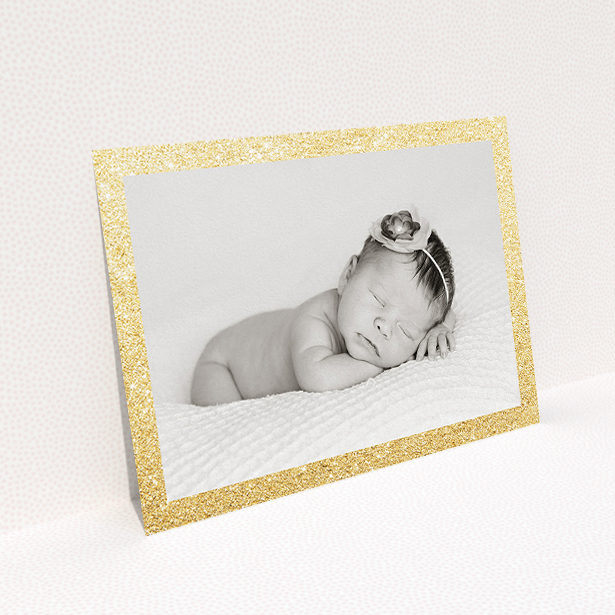 A birth announcement card called "All that Glitters". It is an A5 card in a landscape orientation. It is a photographic birth announcement card with room for 1 photo. "All that Glitters" is available as a flat card, with tones of gold and white.