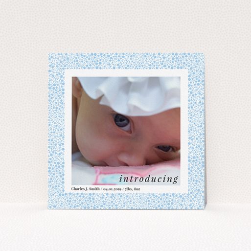 A birth announcement card design titled "Baby Blue Floral". It is a square (148mm x 148mm) card in a square orientation. It is a photographic birth announcement card with room for 1 photo. "Baby Blue Floral" is available as a flat card, with tones of blue and white.
