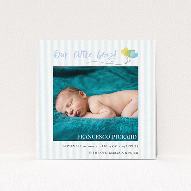 A birth announcement card design titled "Balloooons". It is a square (148mm x 148mm) card in a square orientation. It is a photographic birth announcement card with room for 1 photo. "Balloooons" is available as a flat card, with mainly blue colouring.