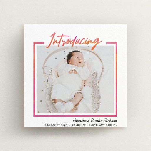 A birth announcement card design named "Bright Introduction". It is a square (148mm x 148mm) card in a square orientation. It is a photographic birth announcement card with room for 1 photo. "Bright Introduction" is available as a flat card, with tones of pink and white.
