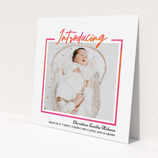 A birth announcement card design named 'Bright Introduction'. It is a square (148mm x 148mm) card in a square orientation. It is a photographic birth announcement card with room for 1 photo. 'Bright Introduction' is available as a flat card, with tones of pink and white.