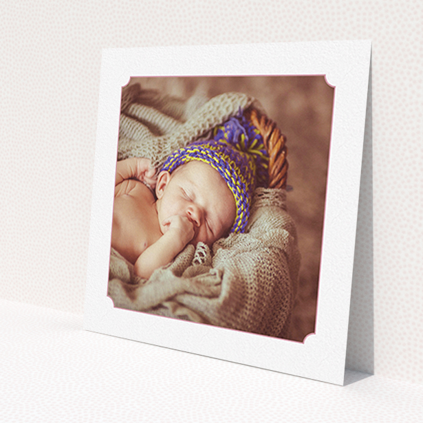 A birth announcement card named 'Classic Frame'. It is a square (148mm x 148mm) card in a square orientation. It is a photographic birth announcement card with room for 1 photo. 'Classic Frame' is available as a flat card, with tones of white and pink.