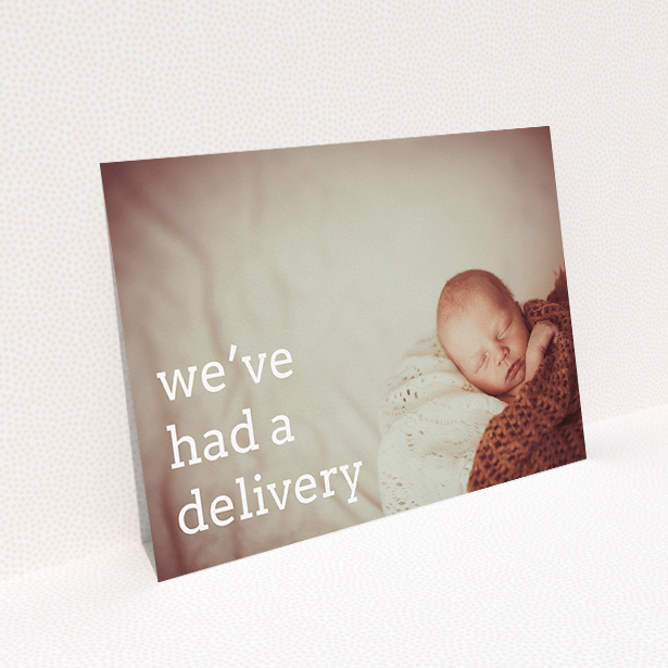 A birth announcement card named "Delivery". It is an A5 card in a landscape orientation. It is a photographic birth announcement card with room for 1 photo. "Delivery" is available as a flat card, with mainly white colouring.