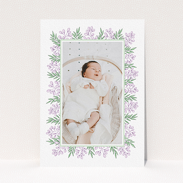 A birth announcement card called "Floral Frame". It is an A6 card in a portrait orientation. It is a photographic birth announcement card with room for 1 photo. "Floral Frame" is available as a flat card, with tones of purple and green.