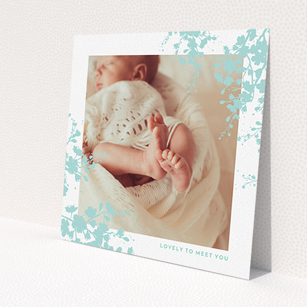 A birth announcement card design called 'Forest Frame'. It is a square (148mm x 148mm) card in a square orientation. It is a photographic birth announcement card with room for 1 photo. 'Forest Frame' is available as a flat card, with tones of blue and white.
