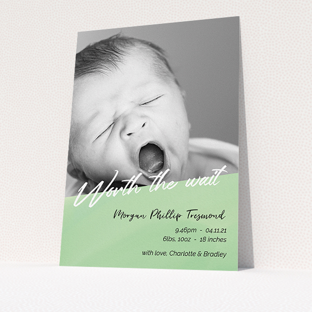 A birth announcement card design named "Green Slant". It is an A5 card in a portrait orientation. It is a photographic birth announcement card with room for 1 photo. "Green Slant" is available as a flat card, with tones of green and white.