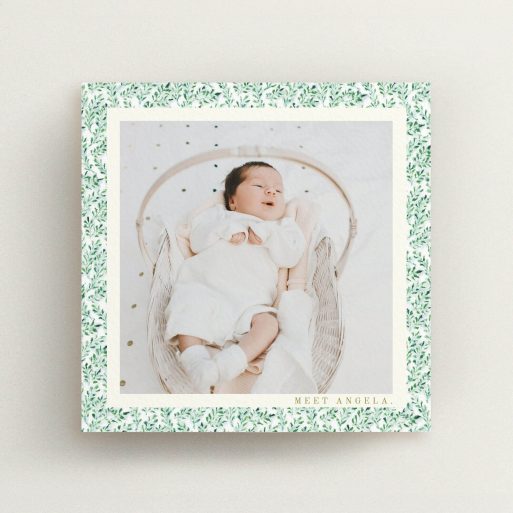 A birth announcement card named "Hedgerow Frame". It is a square (148mm x 148mm) card in a square orientation. It is a photographic birth announcement card with room for 1 photo. "Hedgerow Frame" is available as a flat card, with tones of green and white.