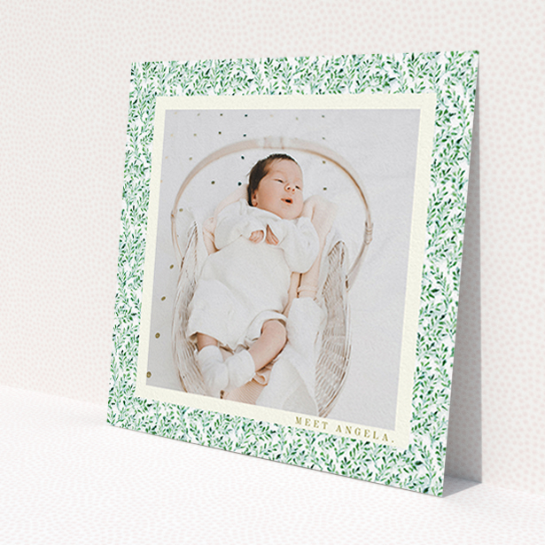 A birth announcement card named "Hedgerow Frame". It is a square (148mm x 148mm) card in a square orientation. It is a photographic birth announcement card with room for 1 photo. "Hedgerow Frame" is available as a flat card, with tones of green and white.