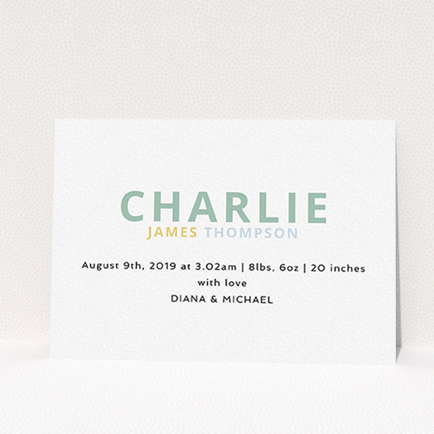 A birth announcement card named "Hello World". It is an A6 card in a landscape orientation. It is a photographic birth announcement card with room for 3 photos. "Hello World" is available as a flat card, with tones of white and green.
