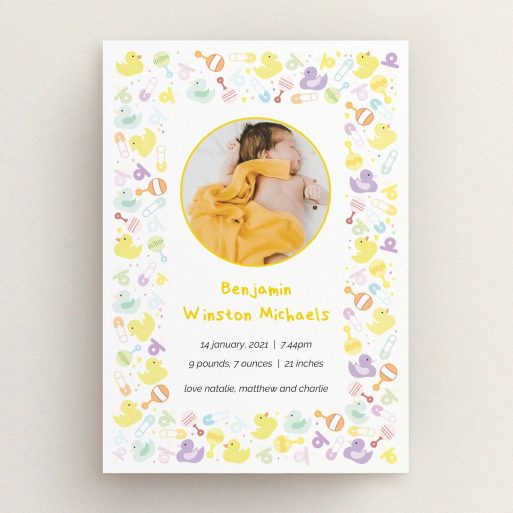 A birth announcement card called "In the Playroom". It is an A5 card in a portrait orientation. It is a photographic birth announcement card with room for 1 photo. "In the Playroom" is available as a flat card, with tones of yellow, white and light purple.