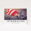 A birth announcement card template titled "Introducing". It is an A5 card in a landscape orientation. It is a photographic birth announcement card with room for 1 photo. "Introducing" is available as a flat card, with mainly white colouring.