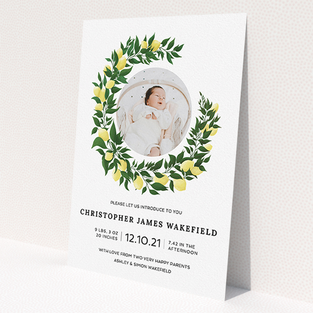 A birth announcement card design called "Lemon Wreath". It is an A5 card in a portrait orientation. It is a photographic birth announcement card with room for 1 photo. "Lemon Wreath" is available as a flat card, with tones of green and white.