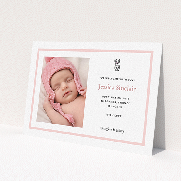 A birth announcement card template titled "Little Bunny". It is an A6 card in a landscape orientation. It is a photographic birth announcement card with room for 1 photo. "Little Bunny" is available as a flat card, with tones of pink and white.