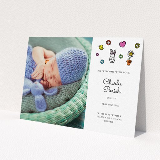 A birth announcement card called 'Nursery Abstract'. It is an A5 card in a landscape orientation. It is a photographic birth announcement card with room for 1 photo. 'Nursery Abstract' is available as a flat card, with tones of white and blue.