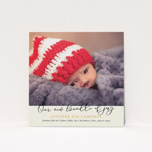A birth announcement card design titled "Our New Bundle of Joy". It is a square (148mm x 148mm) card in a square orientation. It is a photographic birth announcement card with room for 1 photo. "Our New Bundle of Joy" is available as a flat card, with tones of cream and gold.