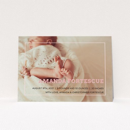 A birth announcement card design named "Over Photo Frame". It is an A5 card in a landscape orientation. It is a photographic birth announcement card with room for 1 photo. "Over Photo Frame" is available as a flat card, with mainly light pink colouring.