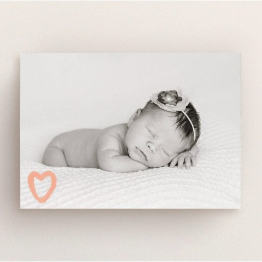 A birth announcement card design called "Pastel Heart". It is an A5 card in a landscape orientation. It is a photographic birth announcement card with room for 1 photo. "Pastel Heart" is available as a flat card, with mainly peach colouring.