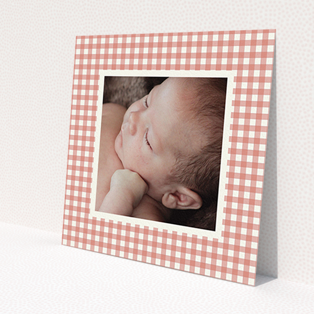A birth announcement card design titled 'Pink Plaid'. It is a square (148mm x 148mm) card in a square orientation. It is a photographic birth announcement card with room for 1 photo. 'Pink Plaid' is available as a flat card, with tones of pink and white.