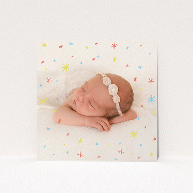 A birth announcement card template titled "Playground Stars". It is a square (148mm x 148mm) card in a square orientation. It is a photographic birth announcement card with room for 1 photo. "Playground Stars" is available as a flat card, with mainly red colouring.
