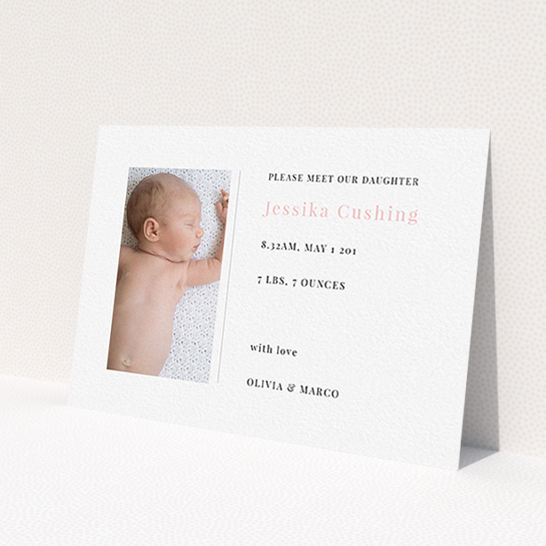 A birth announcement card named 'Please Welcome'. It is an A6 card in a landscape orientation. It is a photographic birth announcement card with room for 1 photo. 'Please Welcome' is available as a flat card, with tones of white and pink.