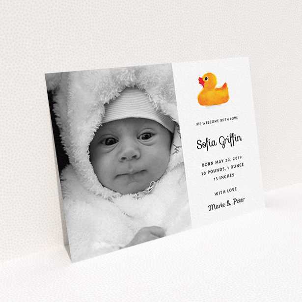 A birth announcement card design titled "Rubber Ducky". It is an A6 card in a landscape orientation. It is a photographic birth announcement card with room for 1 photo. "Rubber Ducky" is available as a flat card, with tones of orange and white.