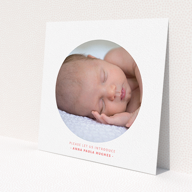 A birth announcement card design titled 'Simple circle frame'. It is a square (148mm x 148mm) card in a square orientation. It is a photographic birth announcement card with room for 1 photo. 'Simple circle frame' is available as a flat card, with tones of white and pink.