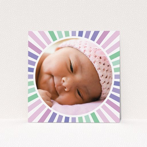 A birth announcement card design called "Sun Centre". It is a square (148mm x 148mm) card in a square orientation. It is a photographic birth announcement card with room for 1 photo. "Sun Centre" is available as a flat card, with mainly light pink colouring.