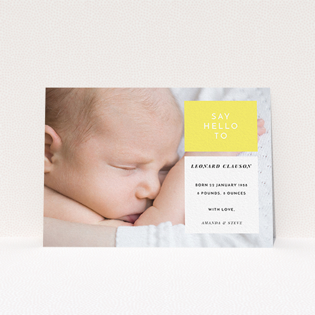 A birth announcement card design called "Two Frames". It is an A6 card in a landscape orientation. It is a photographic birth announcement card with room for 1 photo. "Two Frames" is available as a flat card, with tones of yellow and white.