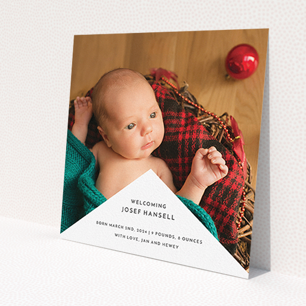 A birth announcement card called 'Wedge Frame'. It is a square (148mm x 148mm) card in a square orientation. It is a photographic birth announcement card with room for 1 photo. 'Wedge Frame' is available as a flat card, with mainly white colouring.