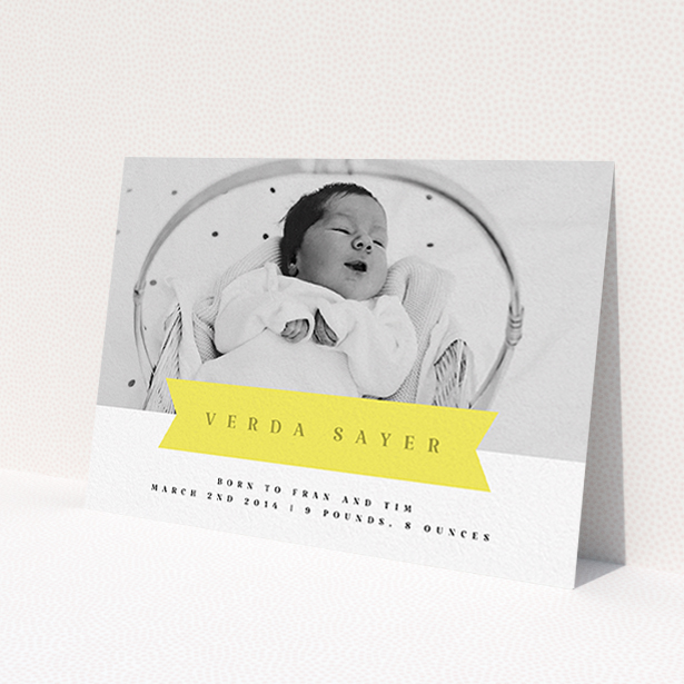 A birth announcement card named 'Yellow Banner'. It is an A6 card in a landscape orientation. It is a photographic birth announcement card with room for 1 photo. 'Yellow Banner' is available as a flat card, with tones of yellow and white.